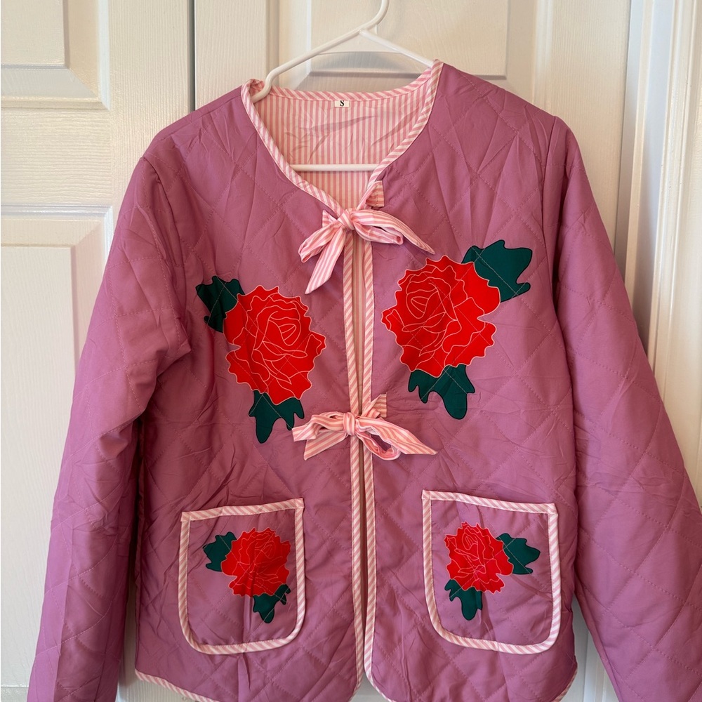 Source Unknown size small Pink Quilted Jacket with Red Floral Design